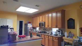 Before and After Cabinet Refinishing and Painting of Walls in Atascocita area 