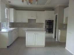 Cabinet Refinishing in TX by Mendoza's Paint & Remodeling