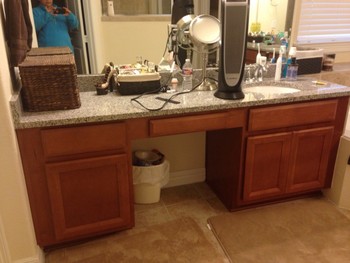 Bathroom vanity before refinishing in Cypress, TX