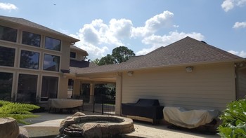 Exterior Painting of Stucco, Staining and Wrought-iron Fences in Spring Branch, TX